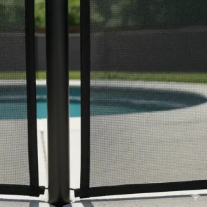 Close-up of the powder-coated aluminum pole and reinforced edging of a durable **removable pool fence** for long-lasting use.