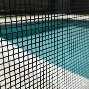 Detailed view of the tightly woven, tear-resistant material of a high-quality mesh pool fence.