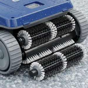 Detailed view of the specialized brushes and wheels on a pool vacuum that are safe and effective for scrubbing the textured Pebble Tec surface.