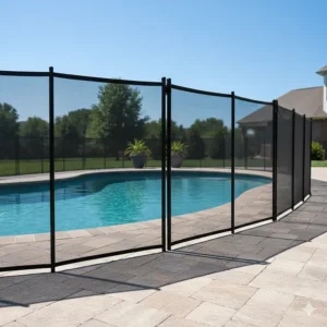 Mesh pool fence system securely installed on a paver deck, demonstrating versatile installation on various surfaces.