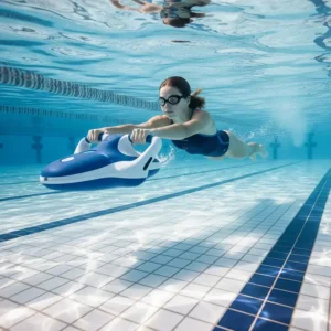 A swimmer using a low-speed pool scooter to assist with their swim training and build confidence in the water.