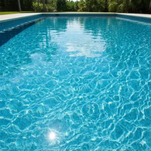 Photo of a sparkling, crystal-clear pool after successfully treating the water with a pool clarifier.