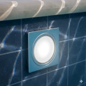 Close-up of a high-efficiency white LED underwater light fixture designed for inground pools.