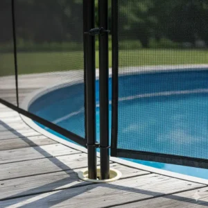 Close-up of a removable mesh pool safety fence panel specifically designed for an above ground pool deck installation.
