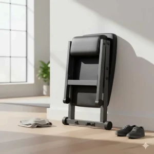 A heavy-duty collapsible weight bench folded upright against a wall for easy storage.