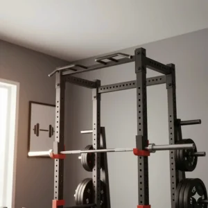 A multi-grip pull-up bar attached to the top of a black steel half rack for home gym use.