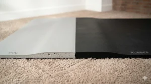 Comparison diagram showing the thickness and durability of a PVC mat versus a rubber treadmill mat for carpet flooring.