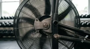 Detailed view of the heavy-duty steel fan wheel that provides wind resistance on an Assault air bike.