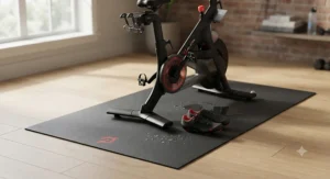High-density exercise bike mat protecting flooring from sweat, a must have Peloton accessory