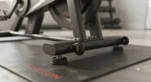 Close-up of the durable steel frame construction and stabilizer feet on the Echelon EX5 indoor bike.