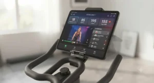 The Echelon Fit app workout dashboard displayed on a tablet mounted to the EX5 bike console.
