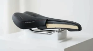 Cutaway view showing the cushioning layers inside a gel bike seat for exercise bike.